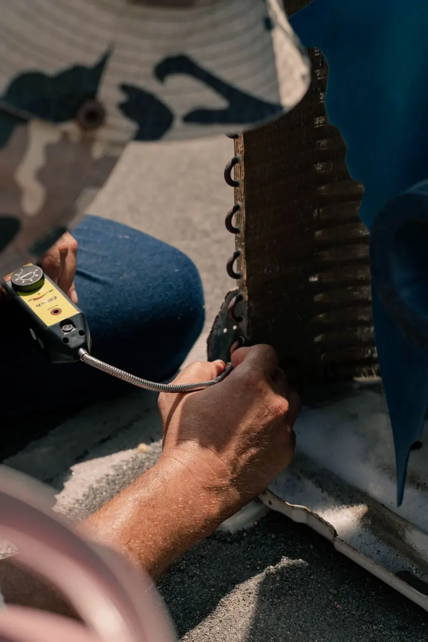 A small-business professional working on site; illustrative stock photograph.